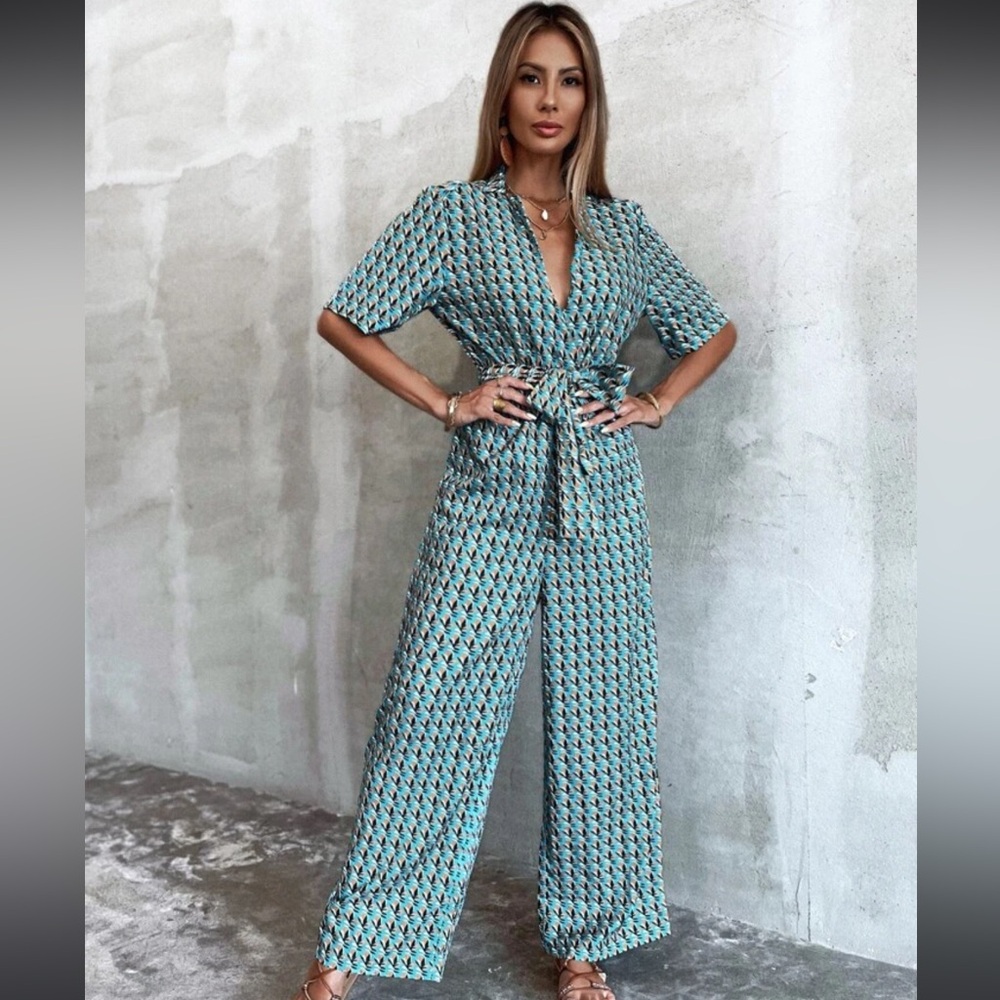 SHEIN Unity Plunging Neck Allover Print Belted Jumpsuit